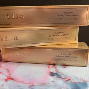 Stila Calligraphy Lip Stain - Elegant Gold Packaging